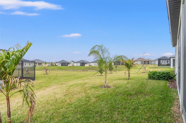 view of yard featuring a residential view