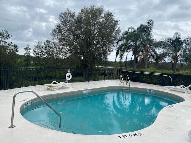 pool featuring fence