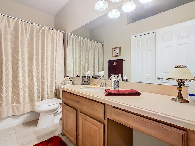 bathroom with a shower with shower curtain, vanity, toilet, and tile patterned floors