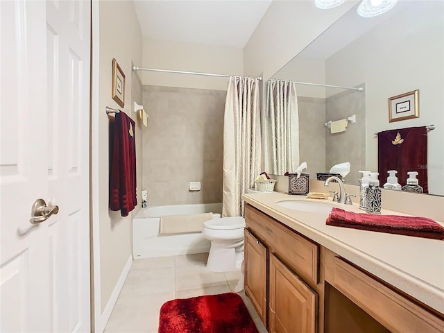 bathroom with tile patterned flooring, toilet, vanity, baseboards, and shower / bath combo with shower curtain