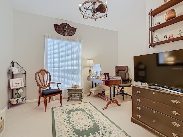 office space with baseboards, a chandelier, and light colored carpet