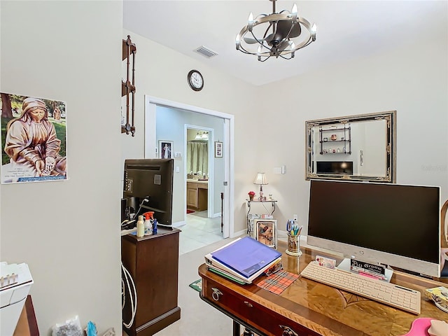 office area with baseboards, visible vents, and a notable chandelier