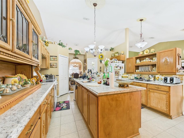 kitchen featuring white appliances, lofted ceiling, a kitchen island, open shelves, and light tile patterned flooring