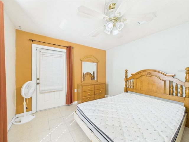 bedroom featuring light tile patterned floors and ceiling fan