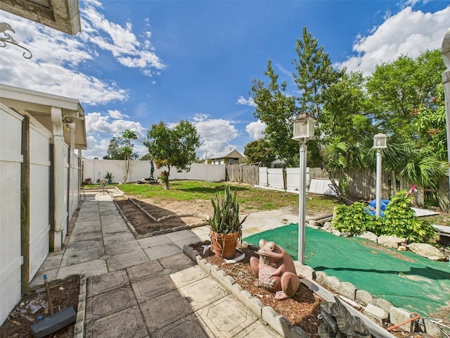 view of patio with a fenced backyard