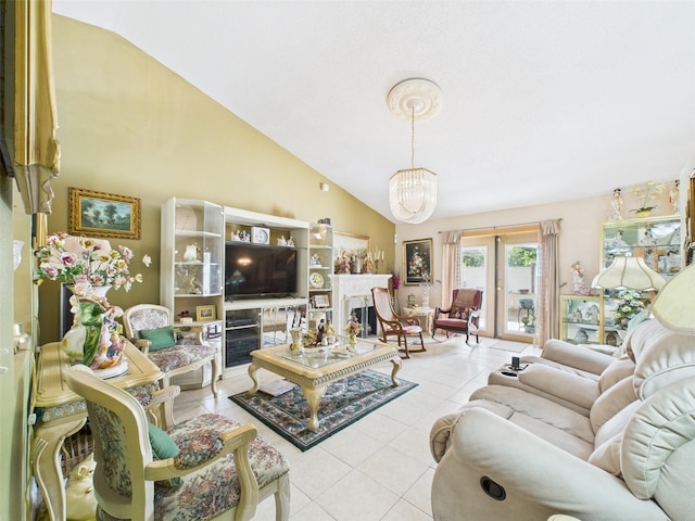 living room with french doors, light tile patterned flooring, a fireplace, and an inviting chandelier