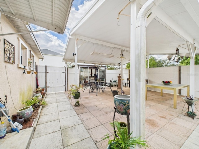 view of patio / terrace with outdoor dining space and a fenced backyard