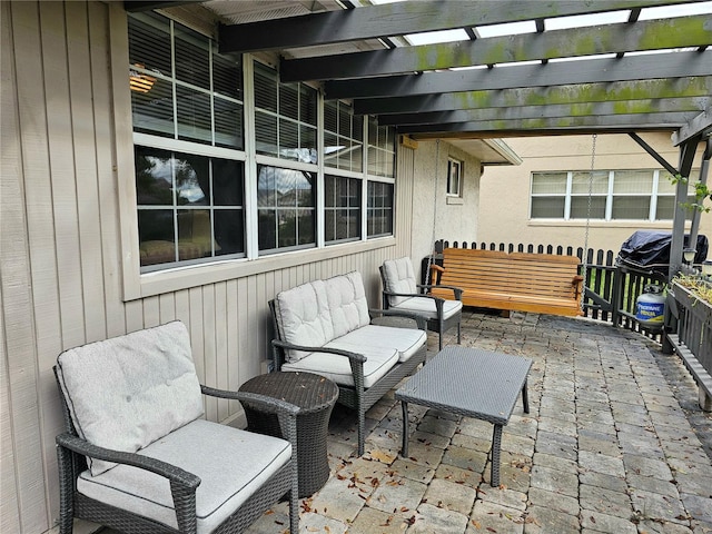 view of patio with outdoor lounge area and a pergola