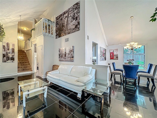 living room with visible vents, stairway, an inviting chandelier, high vaulted ceiling, and tile patterned flooring