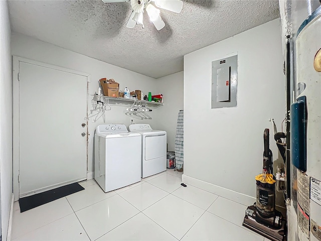 washroom featuring laundry area, electric panel, a ceiling fan, a textured ceiling, and separate washer and dryer