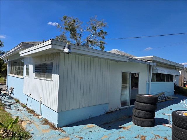 view of property exterior with central AC unit