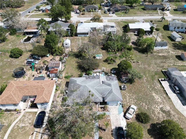 birds eye view of property with a residential view