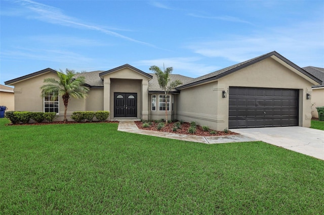 ranch-style home featuring concrete driveway, stucco siding, roof with shingles, an attached garage, and a front yard