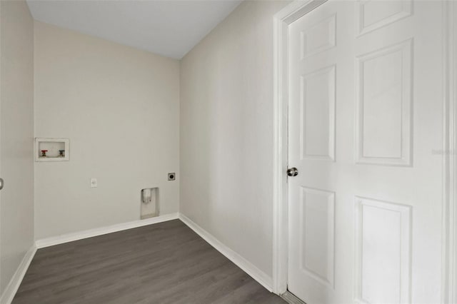 clothes washing area featuring laundry area, baseboards, dark wood finished floors, hookup for a washing machine, and hookup for an electric dryer