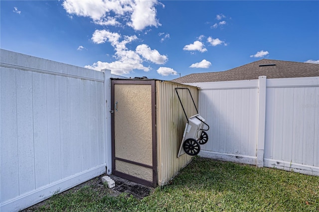 view of gate with fence