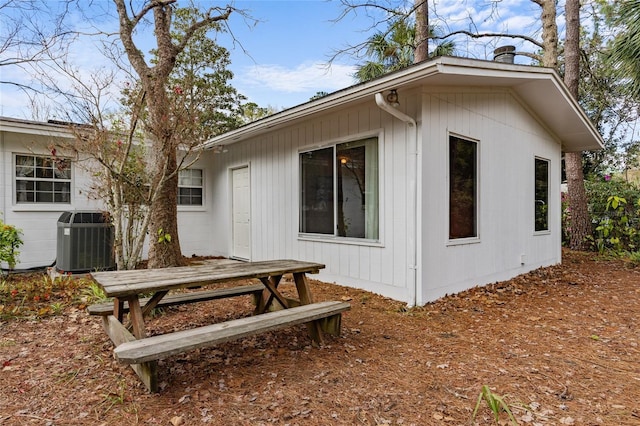 view of property exterior with cooling unit