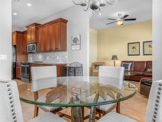 dining area featuring light tile patterned floors, ceiling fan, and recessed lighting