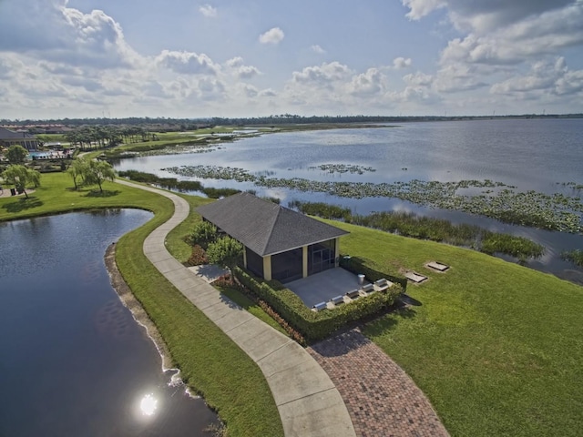 bird's eye view with a water view