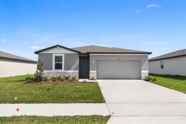 view of front of home with an attached garage, stone siding, concrete driveway, stucco siding, and a front yard