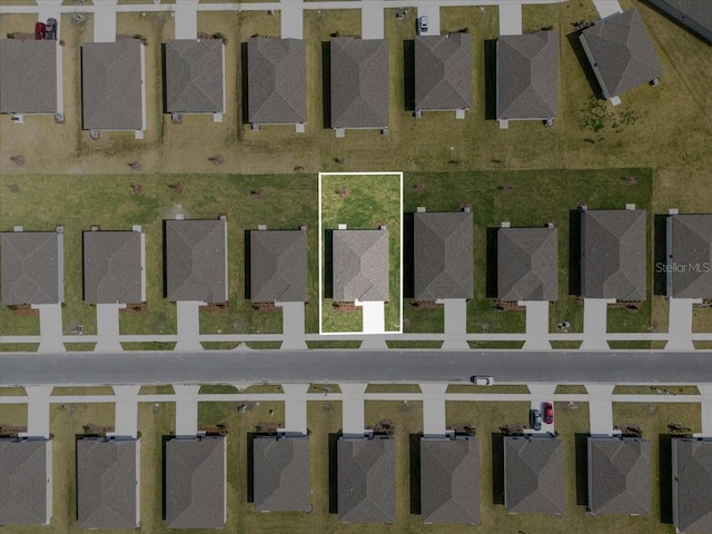 drone / aerial view with a residential view