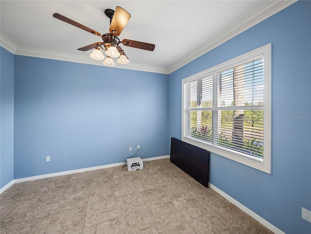 empty room with ornamental molding, baseboards, and a ceiling fan