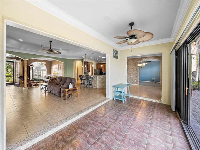 interior space with an outdoor living space and a ceiling fan