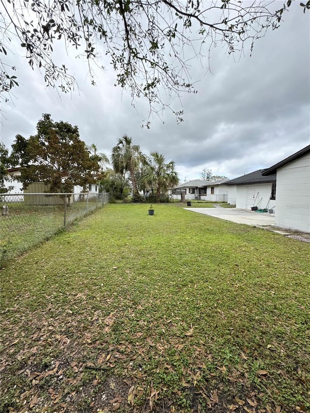 view of yard with fence