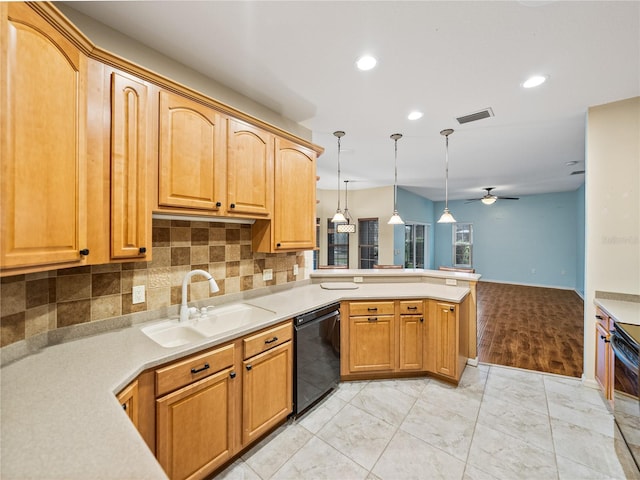 kitchen featuring black dishwasher, light countertops, visible vents, a sink, and a peninsula