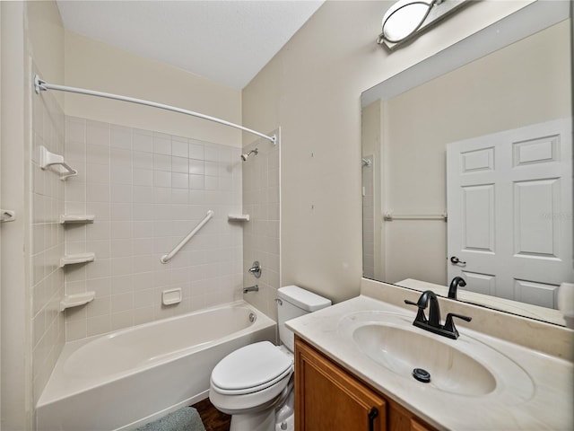 bathroom featuring shower / tub combination, vanity, and toilet