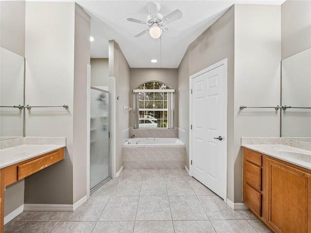full bath featuring ceiling fan, tile patterned floors, vanity, a shower stall, and a bath
