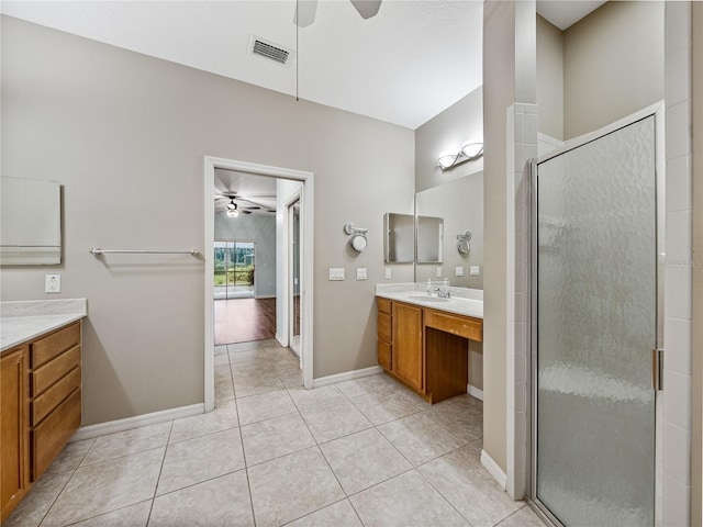 bathroom with visible vents, a ceiling fan, tile patterned flooring, vanity, and a shower stall