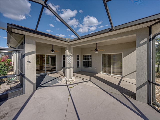 exterior space featuring ceiling fan and a lanai