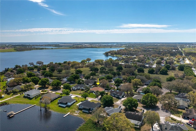 aerial view with a water view and a residential view