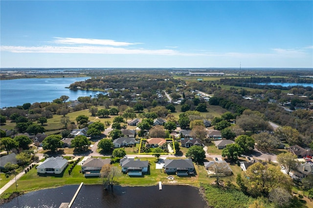 bird's eye view featuring a residential view and a water view