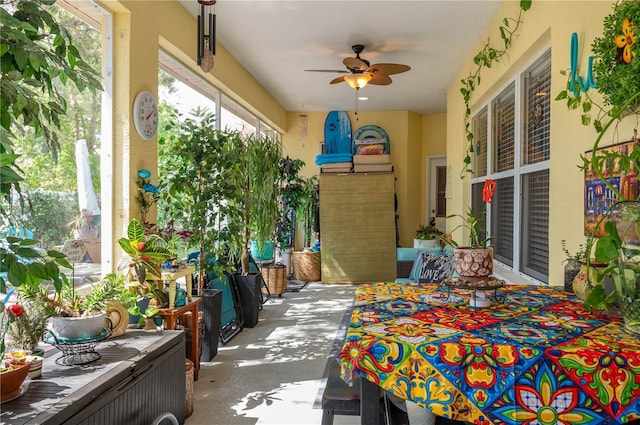 view of patio featuring ceiling fan