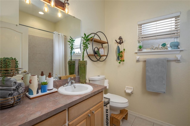 full bathroom featuring vanity, a shower with curtain, baseboards, tile patterned floors, and toilet