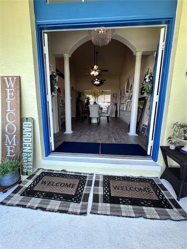 view of exterior entry featuring stucco siding