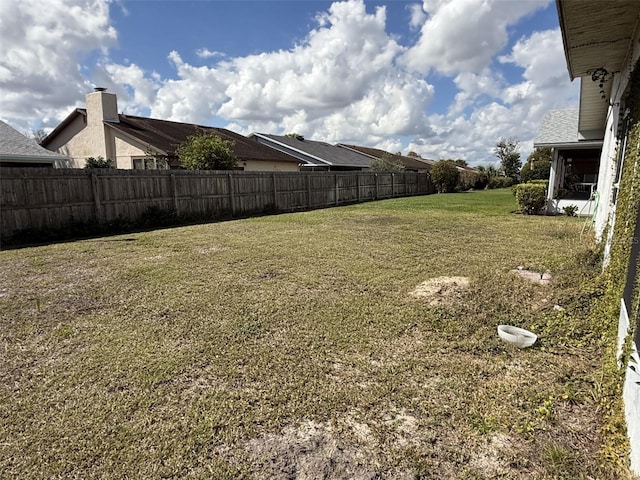 view of yard with fence