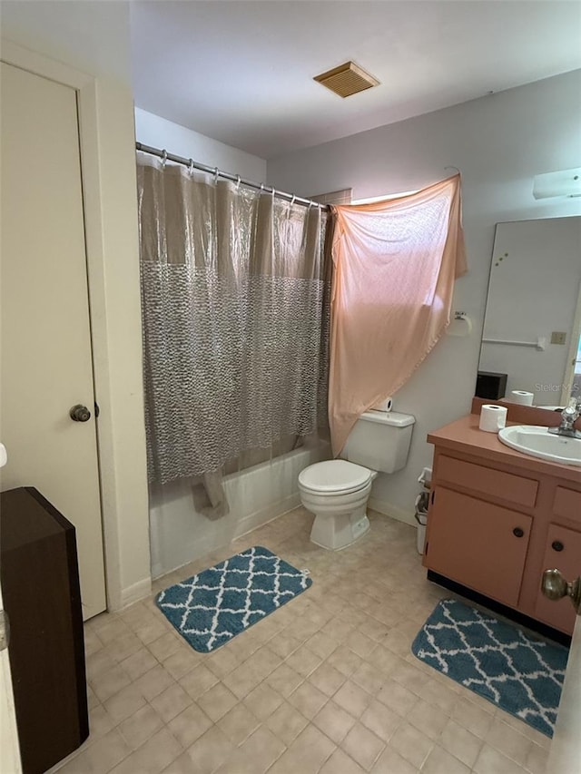 full bathroom with toilet, shower / tub combo, and vanity