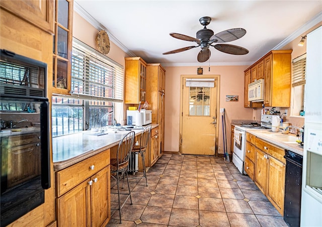 kitchen featuring crown molding, glass insert cabinets, a sink, tile patterned flooring, and white appliances