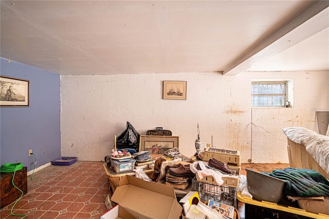 interior space featuring concrete block wall
