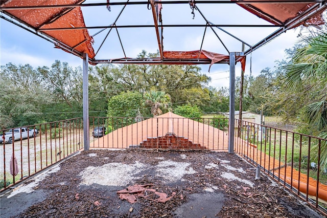 view of patio / terrace featuring fence
