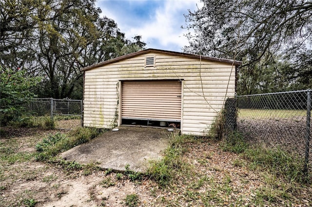 detached garage with fence