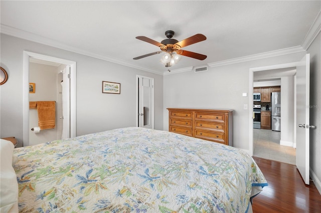 bedroom with dark wood-style flooring, visible vents, a ceiling fan, ornamental molding, and stainless steel refrigerator with ice dispenser