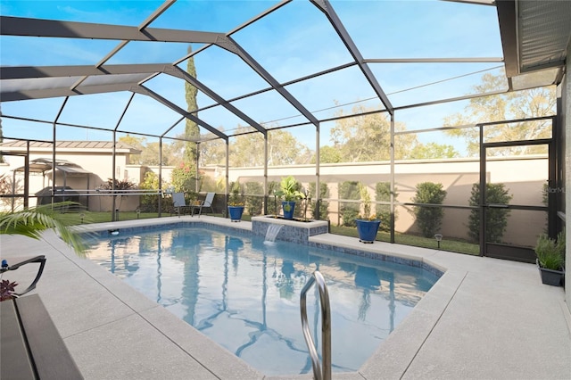 pool featuring a lanai and a patio