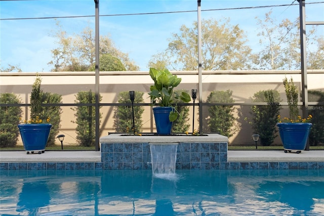 outdoor pool with glass enclosure