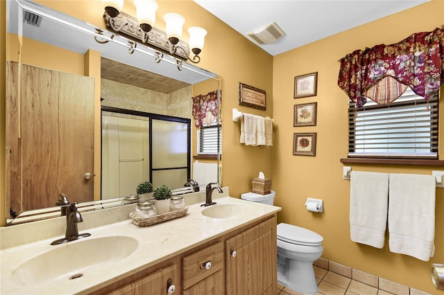 full bath with tile patterned flooring, visible vents, a sink, and toilet