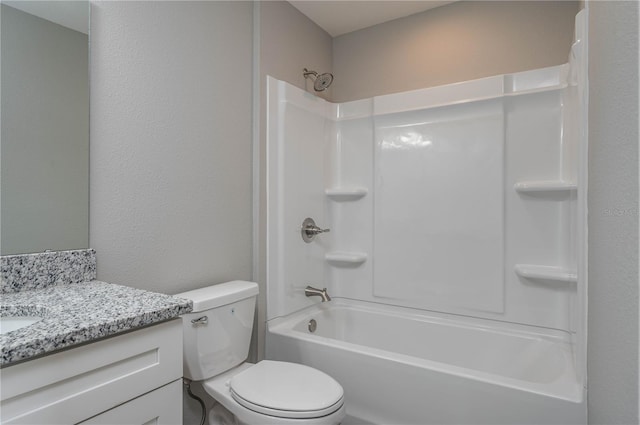 bathroom featuring vanity, toilet, and shower / bathtub combination