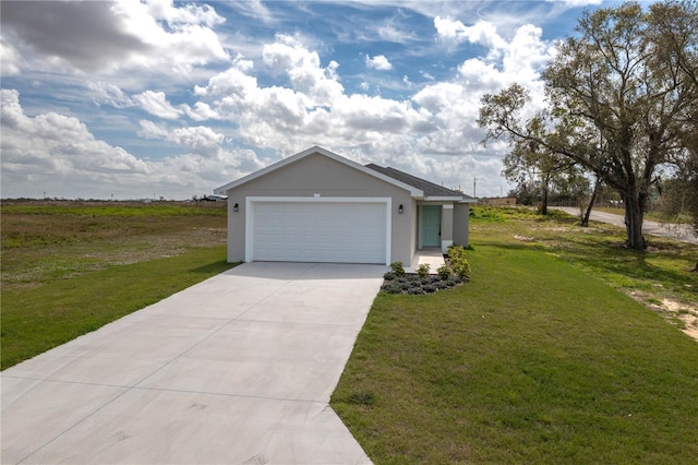 view of front of property featuring a garage, driveway, a front lawn, and stucco siding