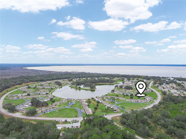 drone / aerial view featuring a water view